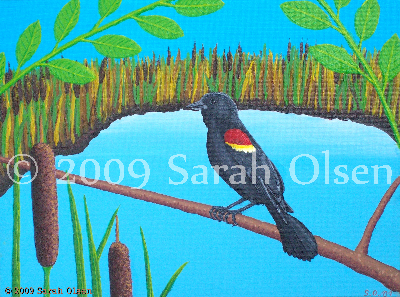 A red winged blackbird sits by a sunny marsh. Individual wing feathers are visible as well as the fuzzy down on the bird’s head. The joints on its bird feet and its claws can be seen tightly wrapped around the small branch it’s perched on. Cattails line the back of the marsh in amongst other grasses. The two cattails in the foreground are highly textured.